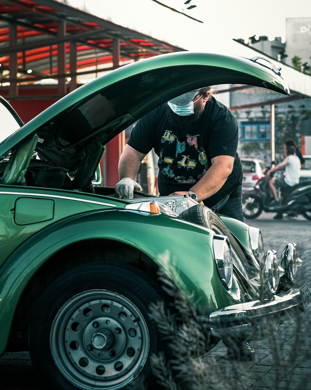 car mechanic checking vehicle